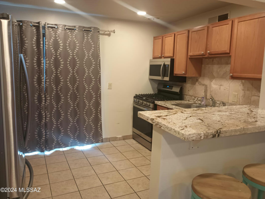 350 N SILVERBELL RD APT 83, TUCSON, AZ 85745, photo 1 of 50